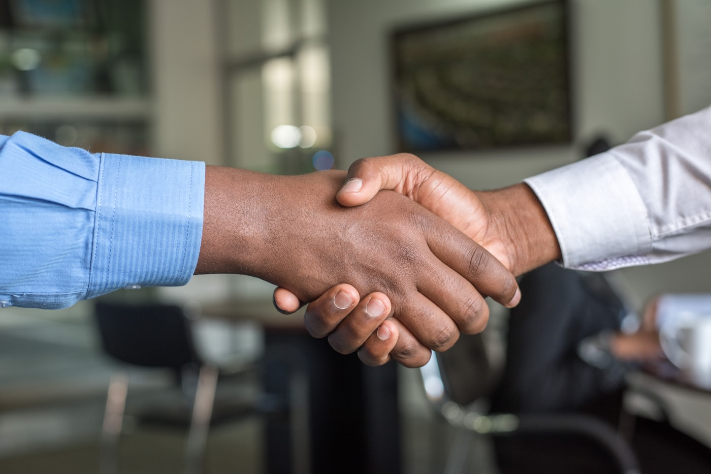 A firm business handshake sealing a partnership